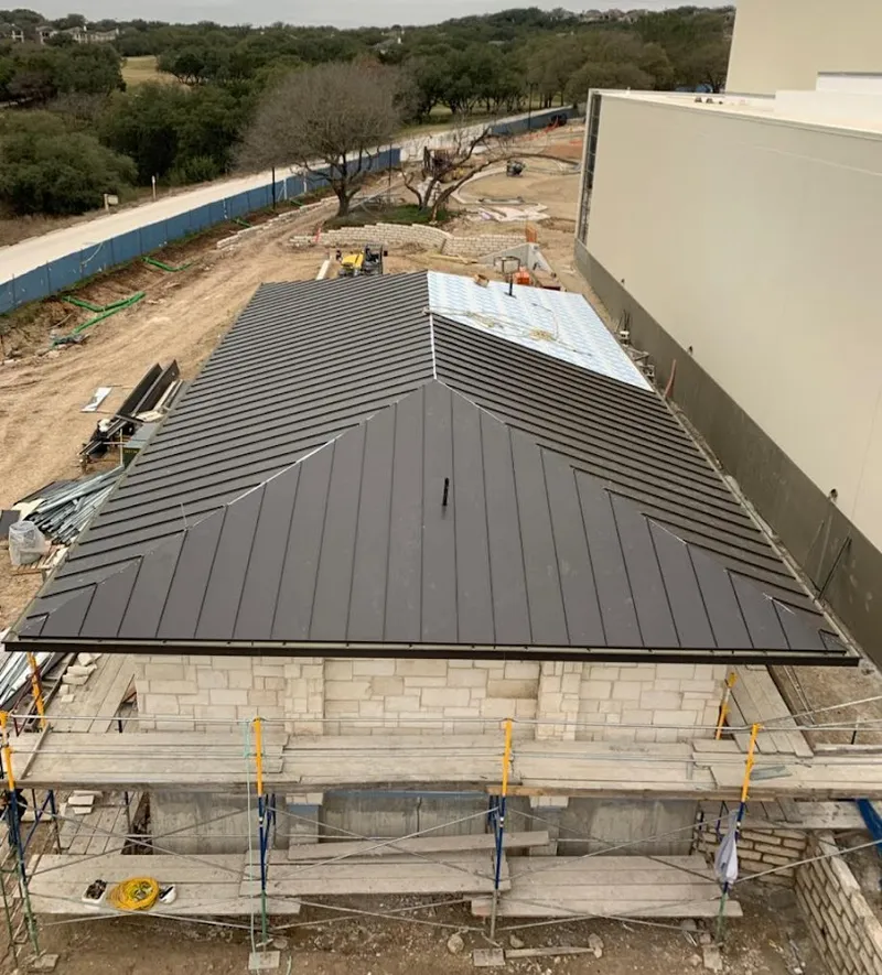 Metal roof new construction with scaffolding in Cockeysville